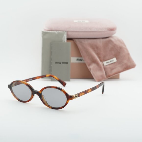 Miu Miu MU04ZS 21C40O Sunglasses Havana Mahogany Oval Frame, Grey Lenses